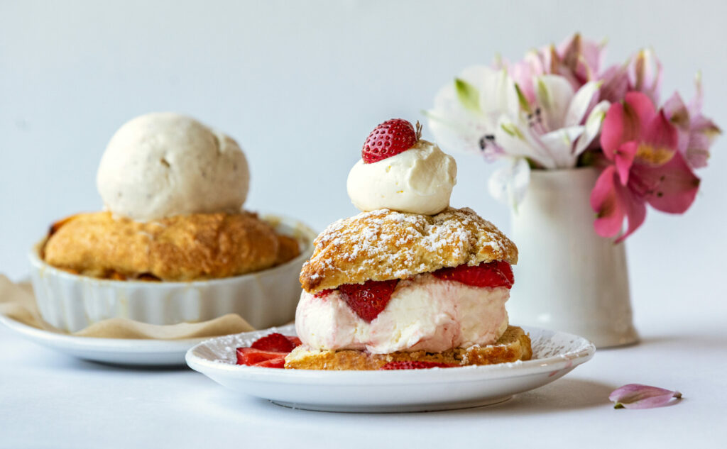 Peach Cobbler with vanilla ice cream and Strawberry Shortcake from Hazel restaurant Thursday, July 10, 2025 celebrating 10 years in Occidental. (John Burgess / The Press Democrat)