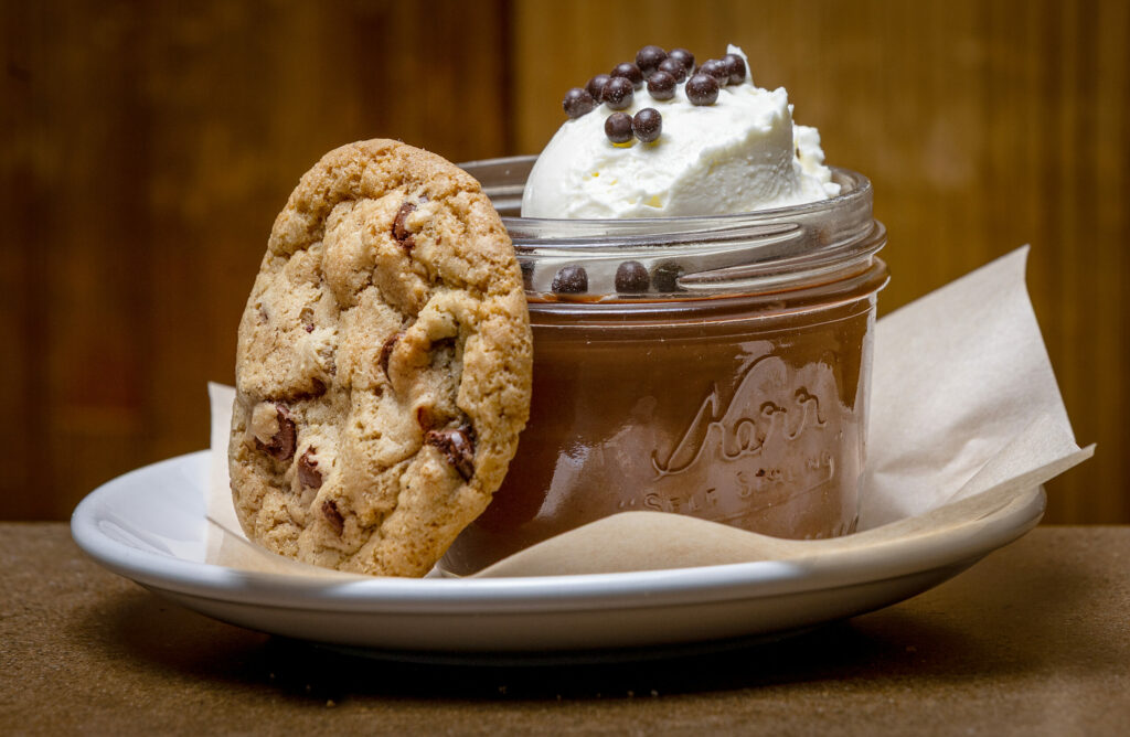 Chocolate Pot de Crème with a cookie from Hazel restaurant Thursday, July 10, 2025 celebrating 10 years in Occidental. (John Burgess / Press Democrat)