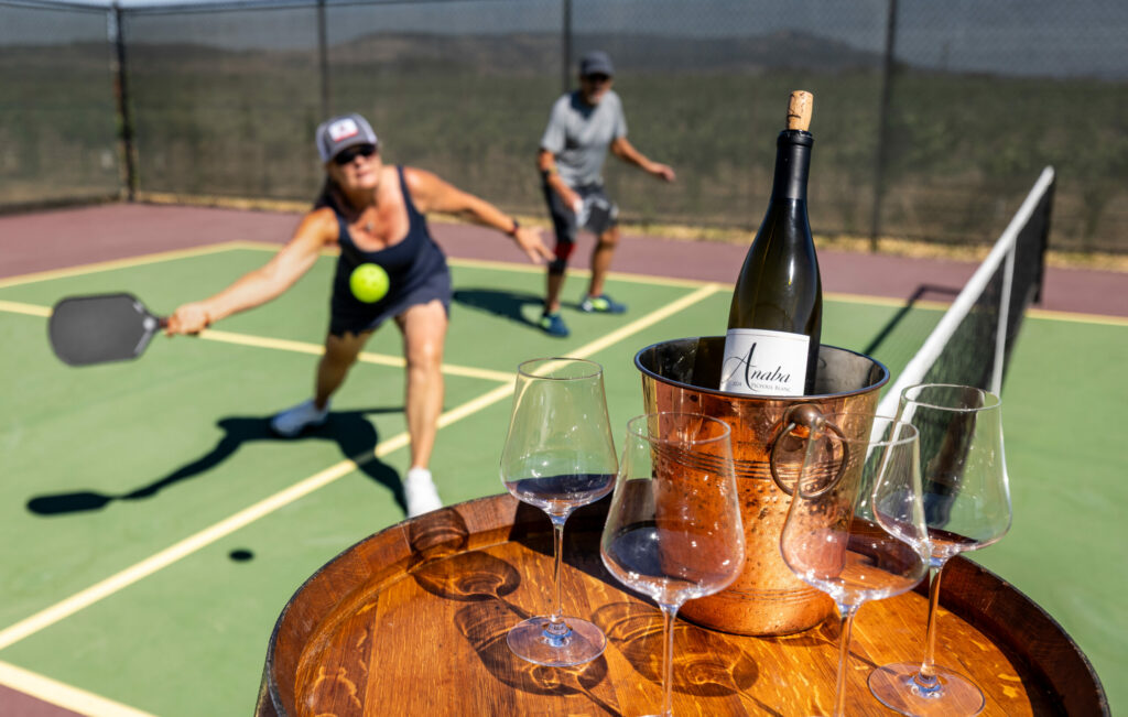 Mia Steiger brought her pickleball group for a one of a kind experience amongst the vineyard at Anaba Winery Thursday, July 10, in Sonoma. (John Burgess / The Press Democrat)