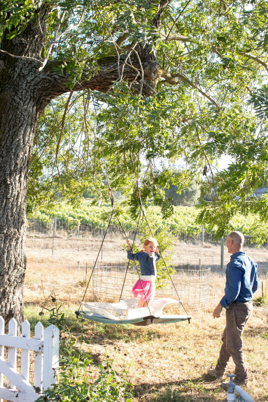 Jason Nichols, who works on home renovations as time and budget permits, takes a break to play with his children Eve, 5, and Ryo, 2. (Eileen Roche / for Sonoma Magazine)