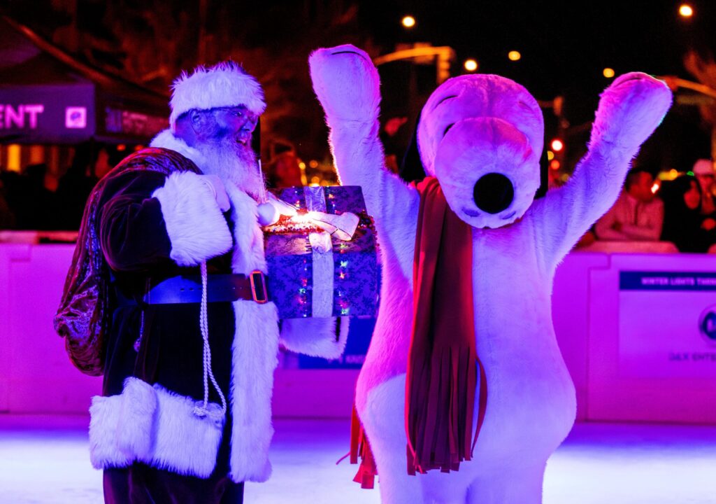 Santa with Snoopy, of the Redwood Ice Theatre Company, countdown to the Christmas Tree lighting during Sonoma County’s Winter Lights and 41st Annual Tree Lighting Celebration, at the Old Courthouse Square in Santa Rosa, Friday, November 29, 2024. (Darryl Bush / For The Press Democrat)