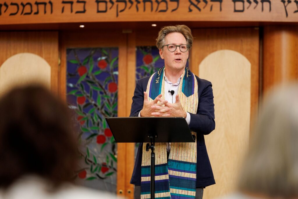 Rabbi Jeremy Morrison talks to his congregation during Shabbat at Congregation Shomrei Torah on August 15, 2025. (Abraham Fuentes/For The Press Democrat)