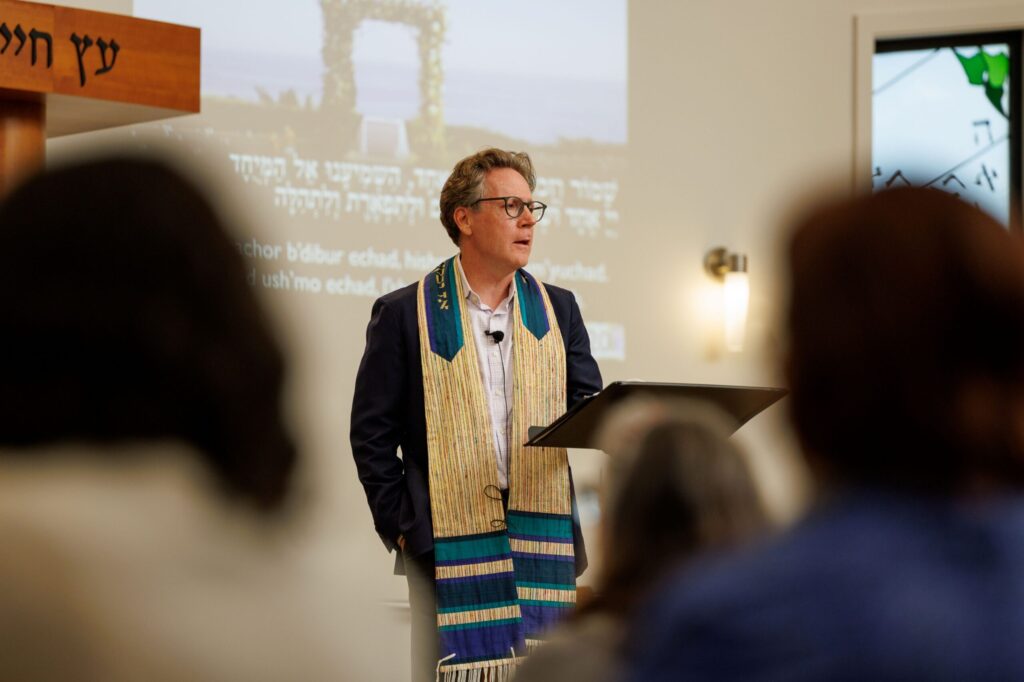 Rabbi Jeremy Morrison talks to his congregation during Shabbat at Congregation Shomrei Torah on August 15, 2025. (Abraham Fuentes/For The Press Democrat)