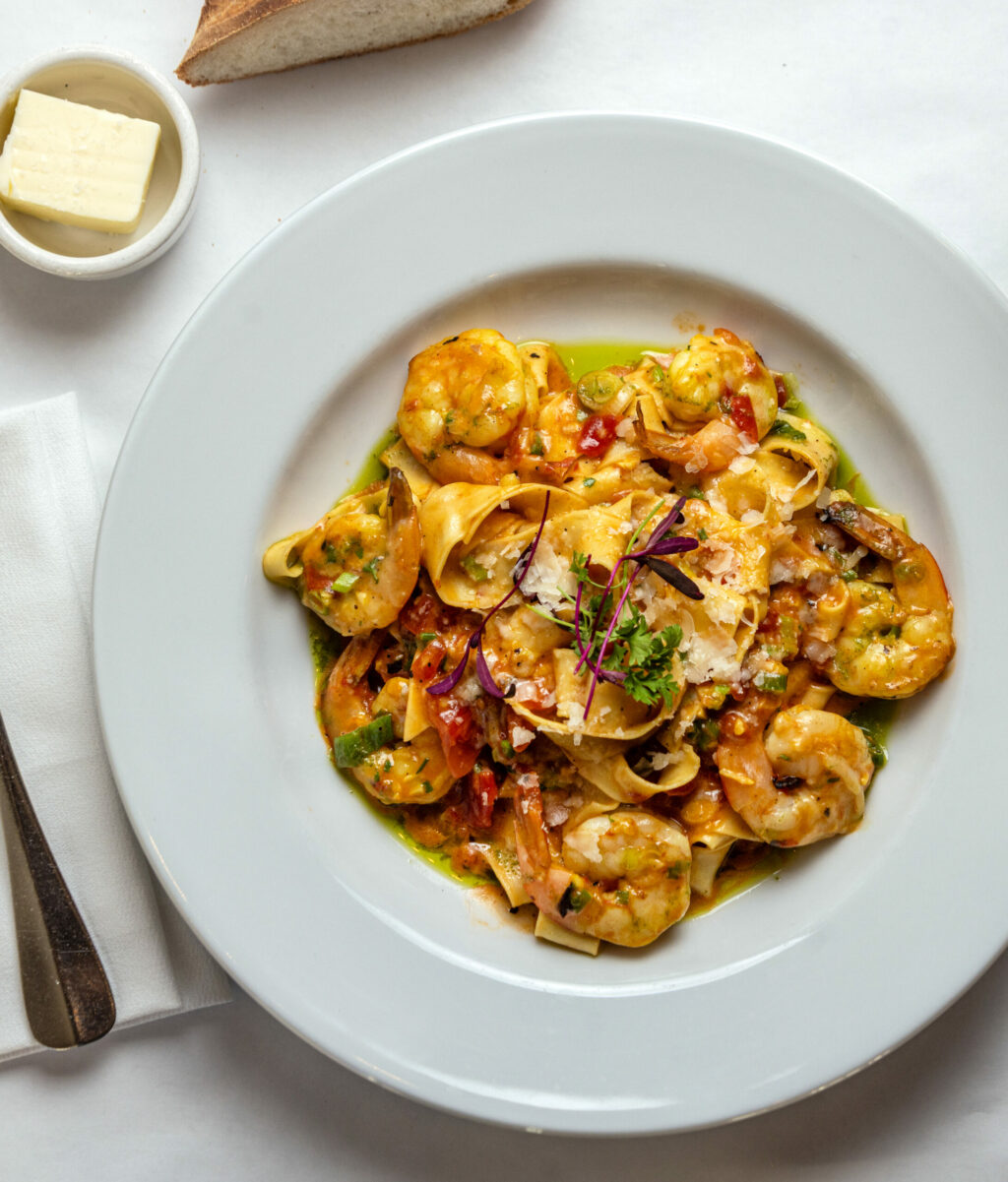 Fresh pappardelle pasta with prawns, saffron, tomato and roasted garlic at Cafe La Haye Wednesday, Oct. 29, 2025, in Sonoma. (John Burgess / The Press Democrat)