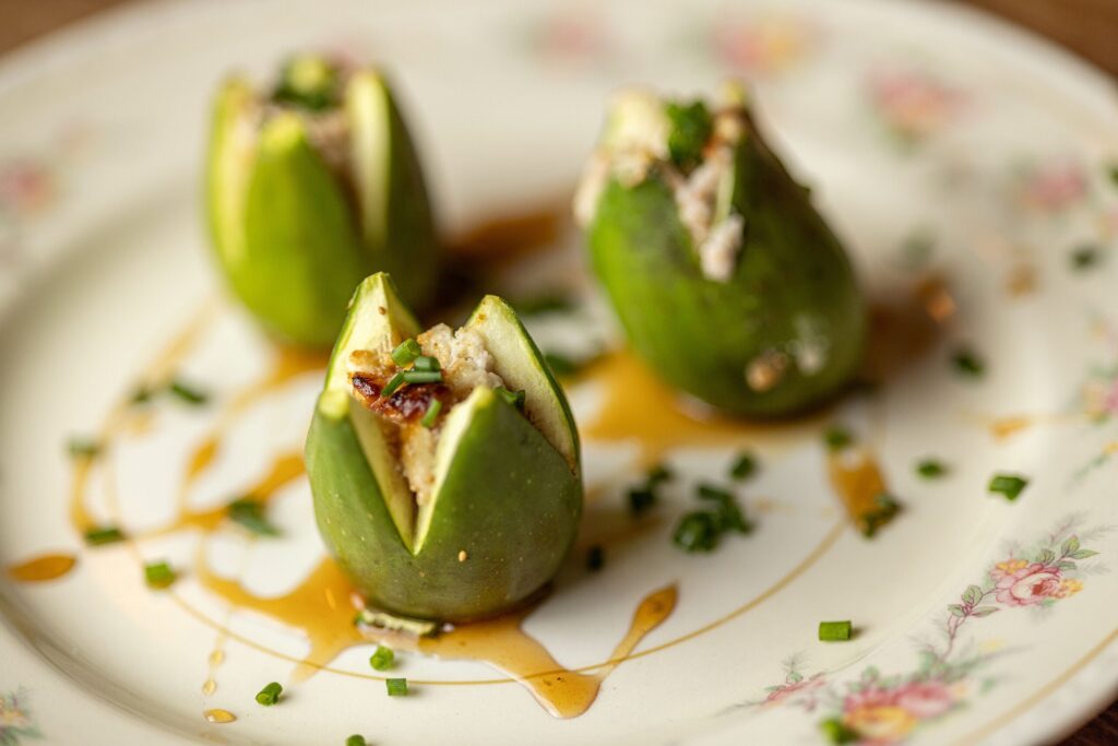 Roasted Figs with La Bodega Fennel Cheese, spiced orange blossom honey, orange zest & juice, apple juice, cinnamon, star anise, clove, lavender pollen and fig vinegar at the Sonoma Wine Shop/La Bodega Kitchen Thursday, Nov. 13, 2025 in Sebastopol. (John Burgess / The Press Democrat)