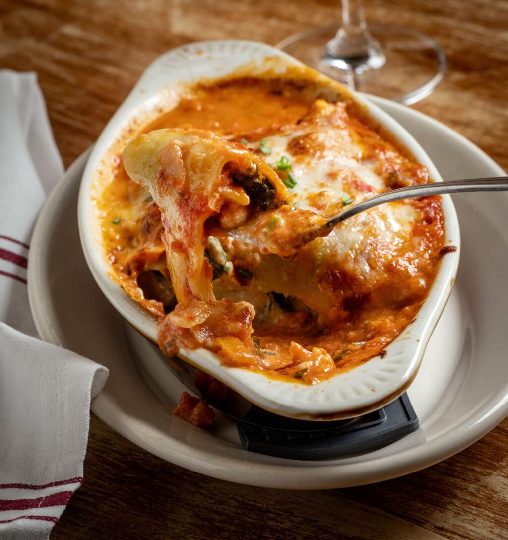 Red, White & Green Lasagna with Vella cheeses, béchamel, chard, and cauliflower at the Sonoma Wine Shop/La Bodega Kitchen Thursday, Nov. 13, 2025 in Sebastopol. (John Burgess / The Press Democrat)