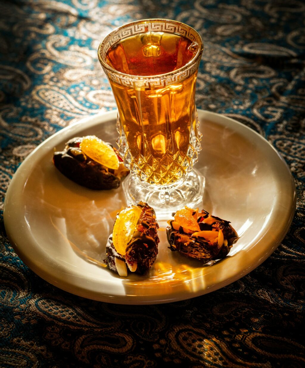 Stuffed Medjool Dates with walnuts with black cardamom tea from the Persian menu, Mondays and Tuesdays at Viva Mēxicana Oct. 29, 2025 in Sebastopol. (John Burgess / The Press Democrat)