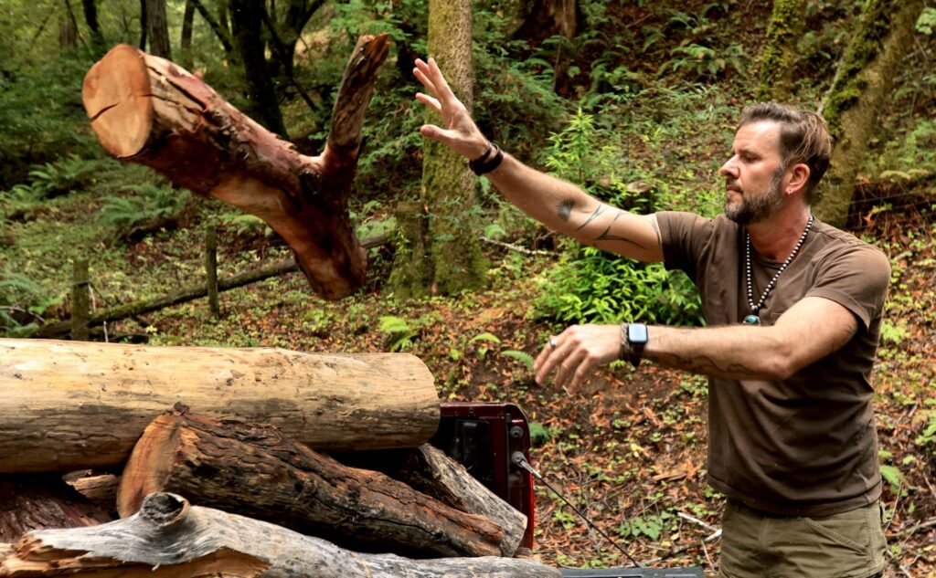 Scott Keneally of Good Fire, Thursday, October 2, 2025, salvages wood from Sonoma County’s woodlands, which were cut for fire protection. Keneally then cuts, boxes and sells the firewood. (Kent Porter / The Press Democrat)