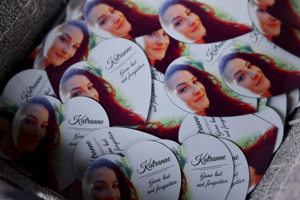 A basket of magnets sit on a table for people to take during a celebration of life event remembering Katranne Pringle at Tolay Lake Regional Park in Petaluma Sunday, March 30, 2025. (Beth Schlanker / The Press Democrat) 