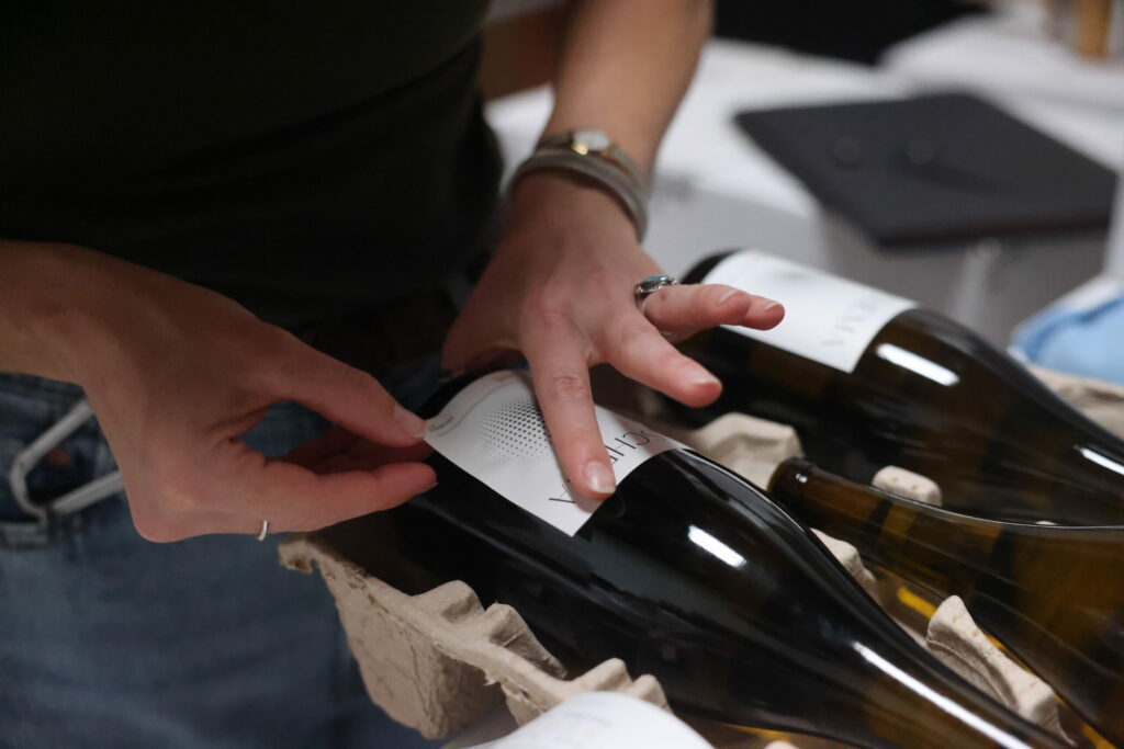 Local wine entrepreneurs take a hands-on approach to all aspects of winemaking — from corking and labeling bottles to printing their personal phone numbers on the label. (Beth Schlanker / for Sonoma Magazine)