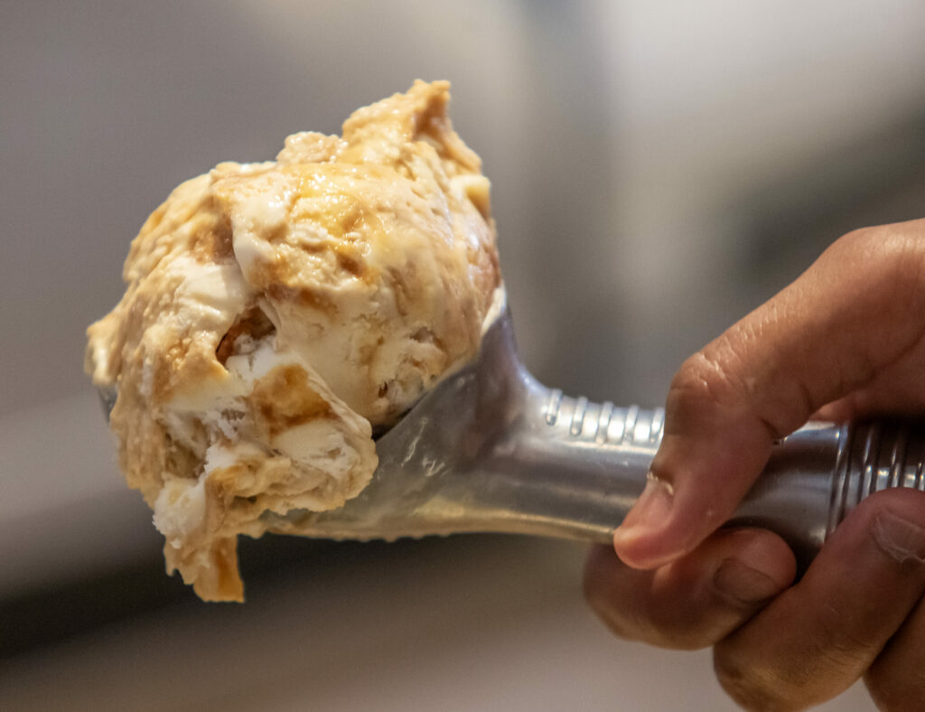 The new Salt & Straw ice creamery opened Friday at Santa Rosa’s Montgomery Village. The Portland-based scoop shop is all about surprising fans with out-of-the-box flavors like Sea Salt Caramel Ribbons, Honey Lavender, and Arbequina Olive Oil. Salted Malted Chocolate Chip Cookie Dough scoop, Friday June 20, 2025. (Chad Surmick / The Press Democrat)