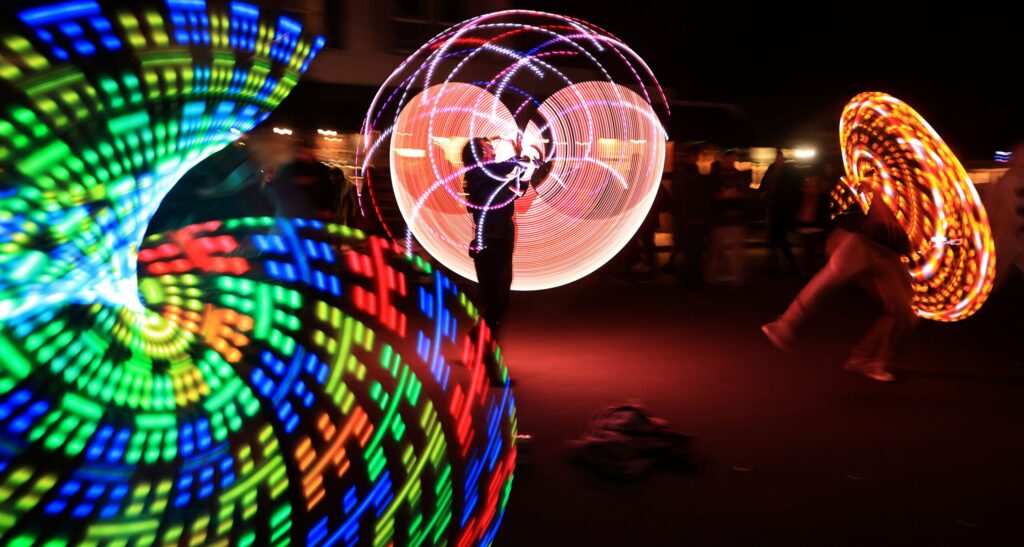The Russian River Hoop and Flow club entertain the masses during the South of A Winterblast celebration, Saturday, Nov. 9, 2024 in Santa Rosa. (Kent Porter / The Press Democrat)