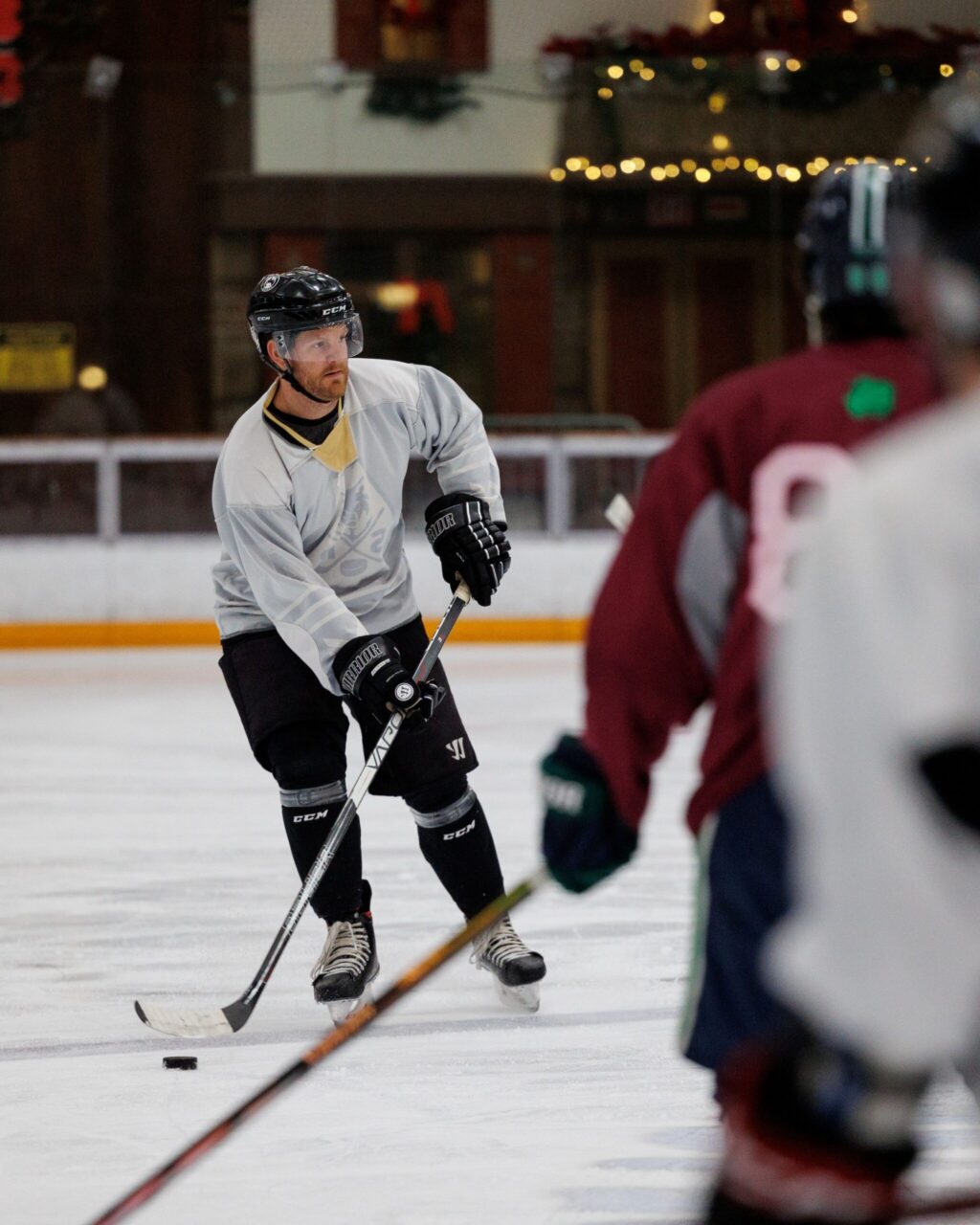 Growler’s Adam Wade skates with the puck during their practice at Snoopy's Home Ice in Santa Rosa on Jan. 2, 2024. (Abraham Fuentes/ For The Press Democrat)