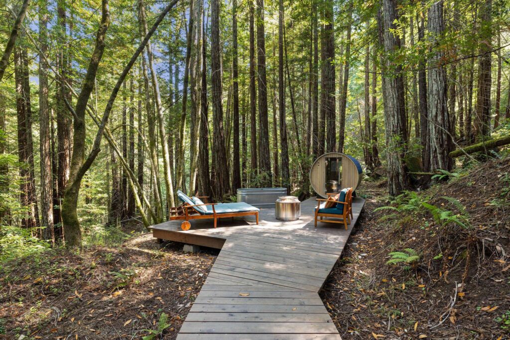 Outdoor sauna and seating area. (Open Homes Photography)