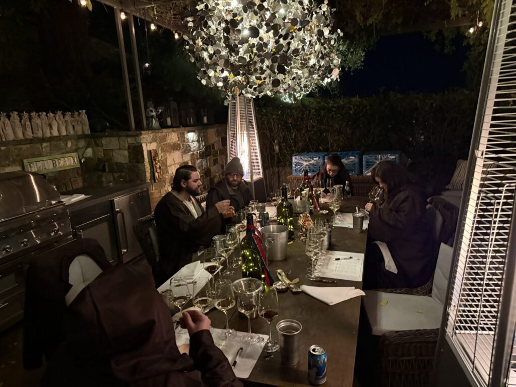 Sommeliers taste wines in a blind tasting competition during the Blind Bottle Bash at Flambeaux Wine in Healdsburg. (Courtesy of TOWN)