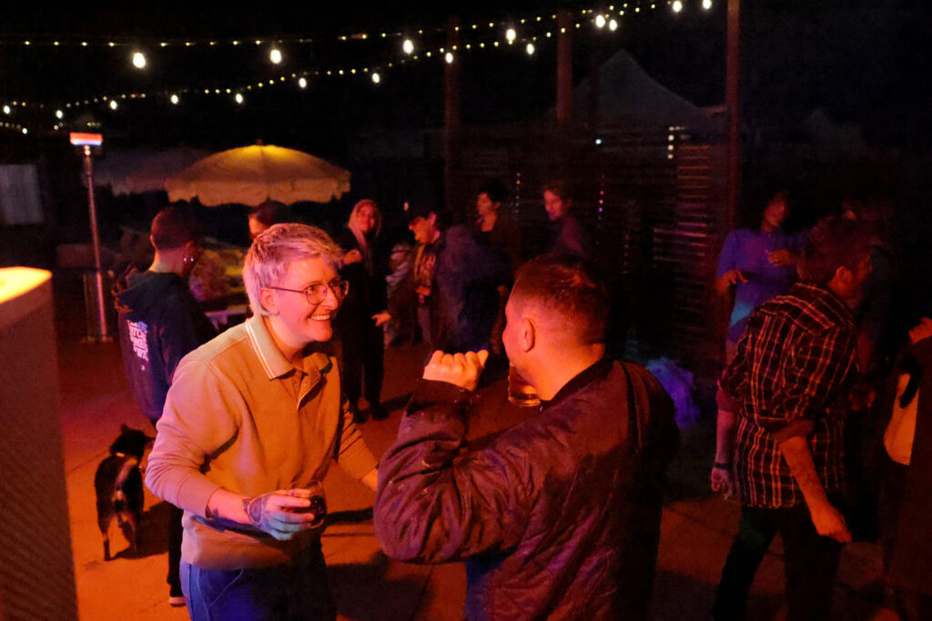 Chef Dany Cleland, left, dances during the Queer Soup Night event at Slow Co. Pizza in Cotati Sunday, Nov. 23, 2025. (Beth Schlanker / The Press Democrat)