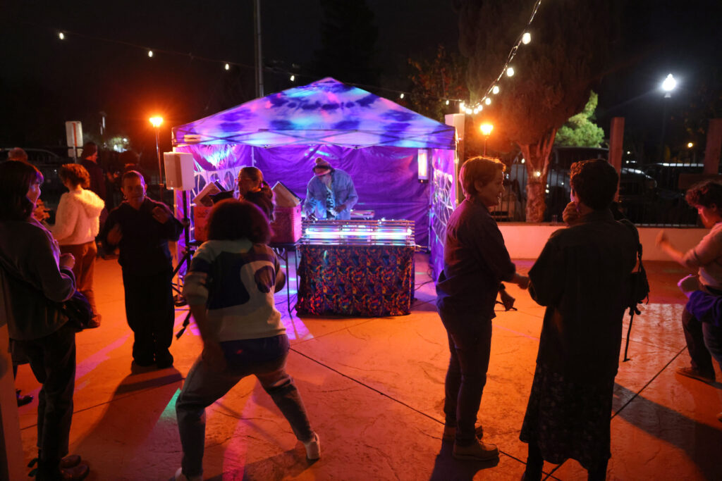 Guests dance during the Queer Soup Night event at Slow Co. Pizza in Cotati Sunday, Nov. 23, 2025. (Beth Schlanker / The Press Democrat)