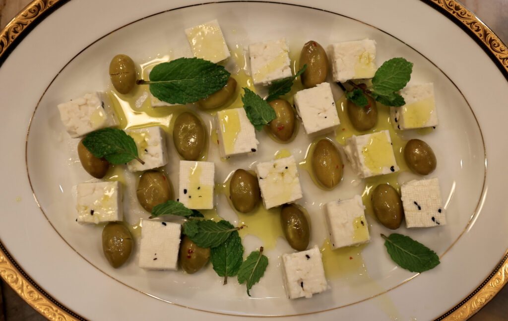 White cheese with Husary olives and Husary Olive Oil, Wednesday, Nov. 26, 2025, near Graton. (Kent Porter / The Press Democrat)