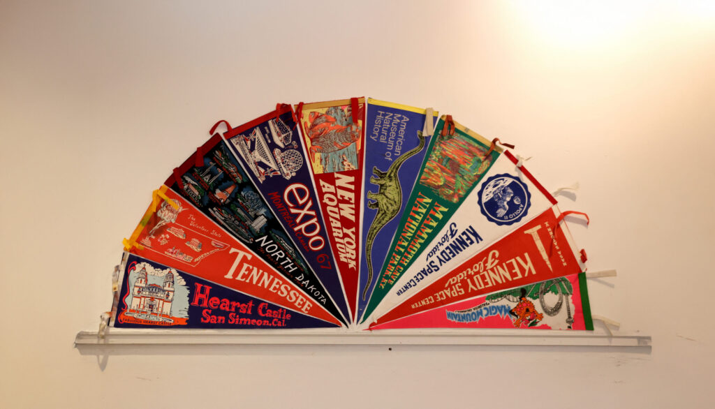 Vintage pennants for sale hang on the wall at Trove in Sonoma Thursday, Sept. 18, 2025. (Beth Schlanker / The Press Democrat)