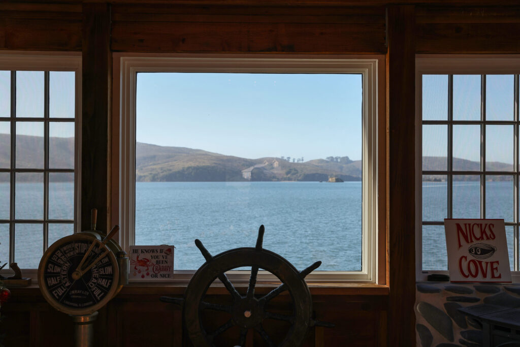The view of Tomales Bay from the newly reopened Boat Shack at Nick’s Cove in Marshall on Wednesday, December 10, 2025. (Christopher Chung/The Press Democrat)
