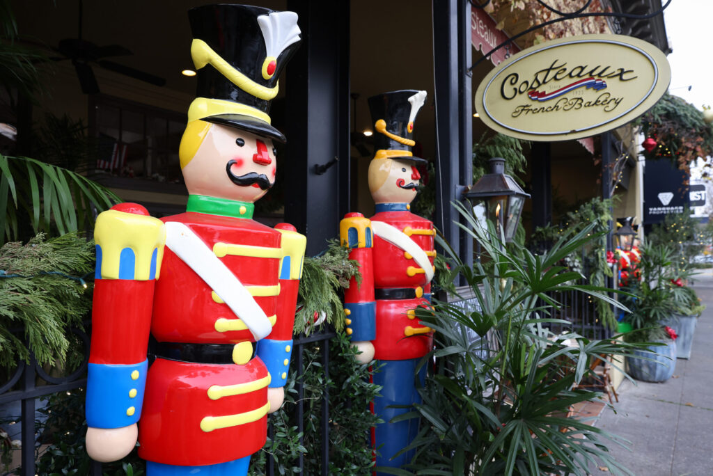 Large toy soldiers stand guard in front of Costeaux French Bakery in Healdsburg on Tuesday, December 9, 2025. (Christopher Chung/The Press Democrat)
