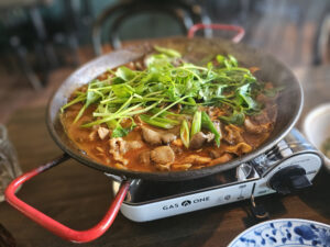 Beef hot pot at Bazaar Sonoma's Korean pop-up preview. (Heather Irwin / The Press Democrat)