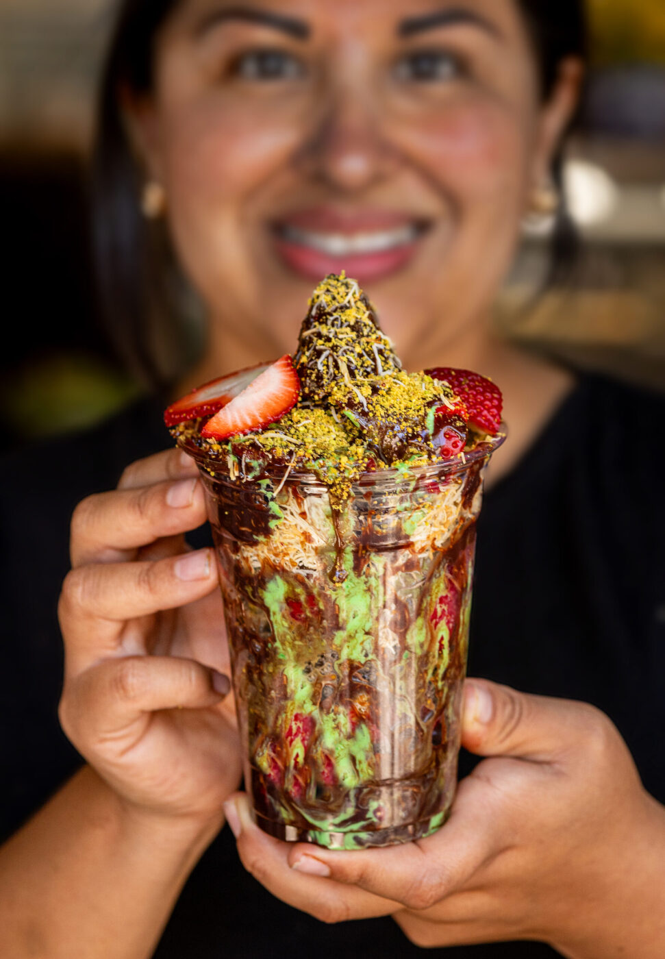 The Urban Deli in Petaluma imports their Dubai Chocolate bars from the source in the Middle East to make their Dubai chocolate Strawberry Parfait held by Marla Qudsieh Friday, May 8, 2025 in Petaluma. (John Burgess / The Press Democrat)