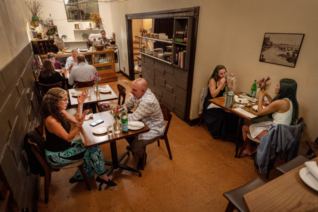 The quaint Street Social has the vibe of a Parisian bistro Thursday, August 14, 2025 Petaluma. (John Burgess / The Press Democrat)