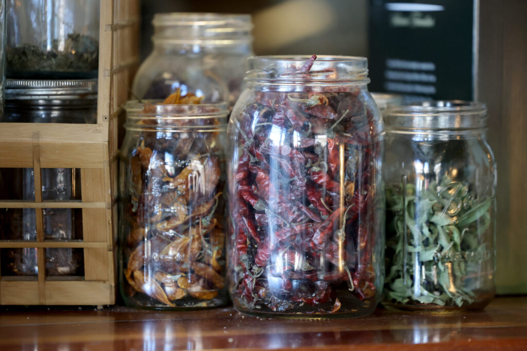 Jars of dried chilis and herbs at Pearl Petaluma in Petaluma Thursday, Jan. 8, 2026. (Beth Schlanker / The Press-Democrat)