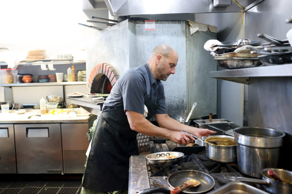 Chef Brian Leitner cooks during a lunch service at Pearl Petaluma in Petaluma Thursday, Jan. 8, 2026. (Beth Schlanker / The Press-Democrat)