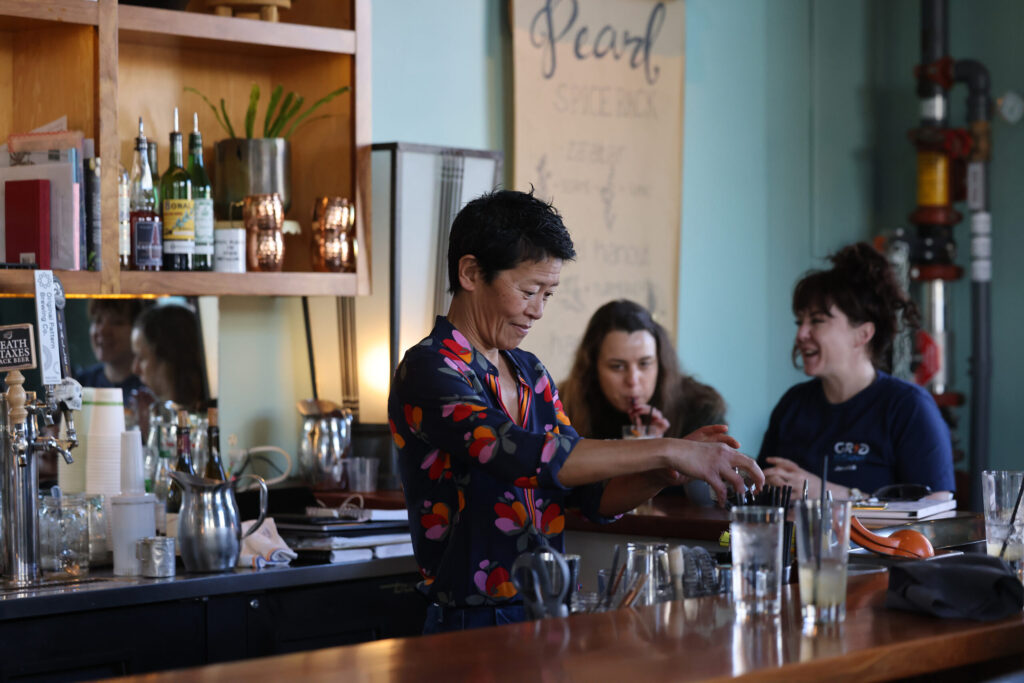 Annette Yang mixes drinks while working the front of the house at Pearl Petaluma in Petaluma Thursday, Jan. 8, 2026. (Beth Schlanker / The Press-Democrat)