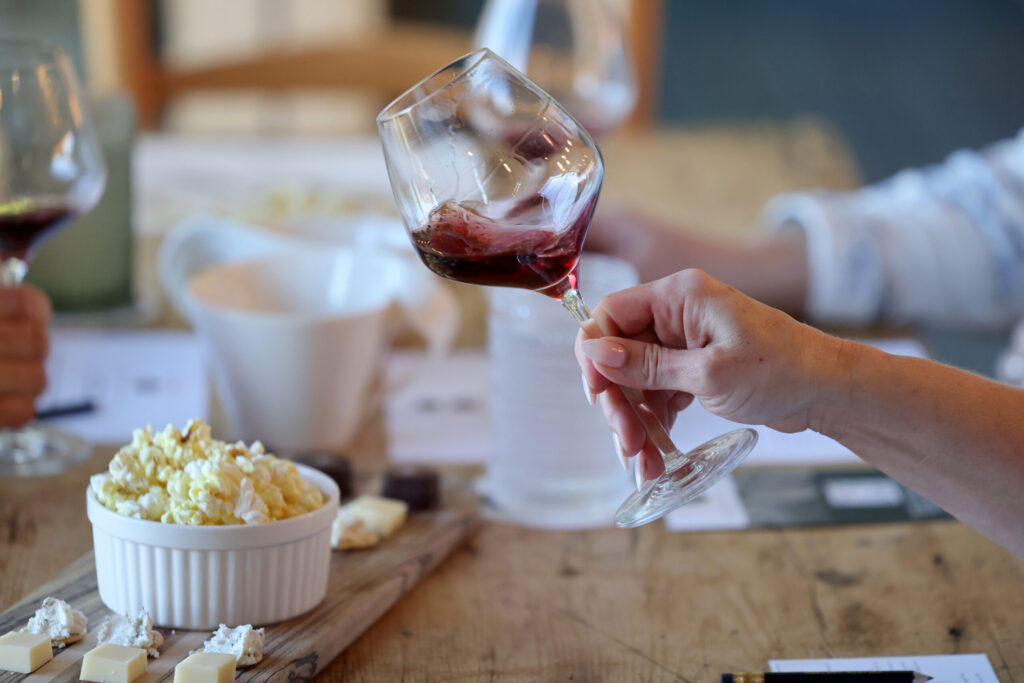 Guest Shawna Keech samples a glass of Pinot Noir at Halleck Vineyard in Sebastopol Thursday, Jan. 15, 2026. (Beth Schlanker / The Press Democrat)