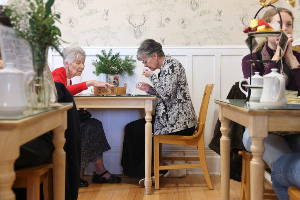 Sisters Carol Winder, left, and Kara Emmerling smell samples of loose tea at Muir’s Tea Room in Sebastopol Tuesday, Dec. 30, 2025. (Beth Schlanker / The Press Democrat)