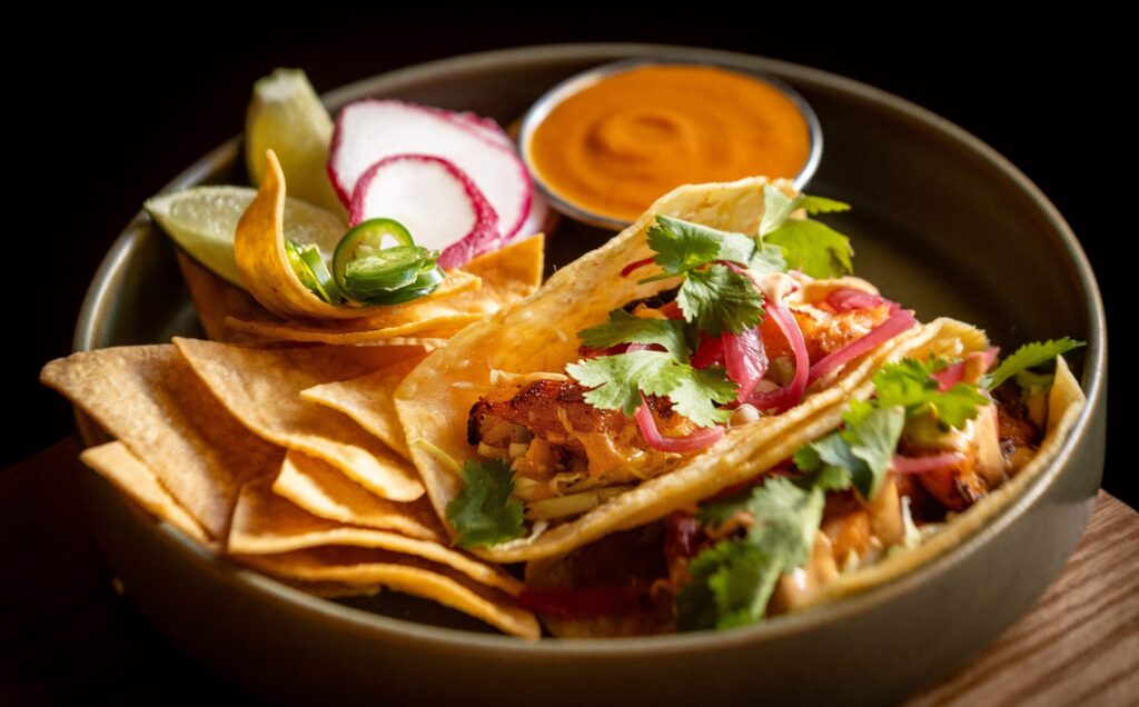 Grilled Achiote Fish Tacos with house-made salsa, pickled onion, and chipotle- lime crema from the Healdsburg Bar & Grill Thursday, Jan. 22, 2026 in downtown Healdsburg. (John Burgess / The Press Democrat)