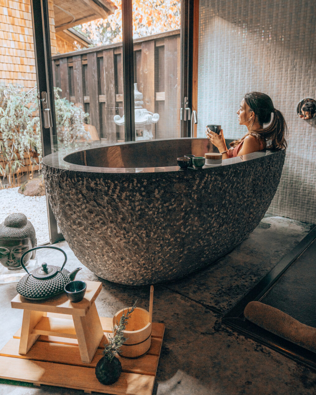 A deep granite soaking tub in one of the nine ryokan-style suites at Gaige House in Glen Ellen. (Catarina Mello / Sonoma County Tourism)