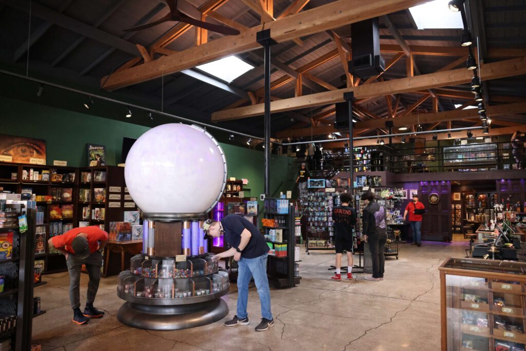 Customers browse merchandise for sale at the newly opened Goblin Bros. Games & Gear in Santa Rosa, Sunday, April 14, 2024. (Beth Schlanker / The Press Democrat)
