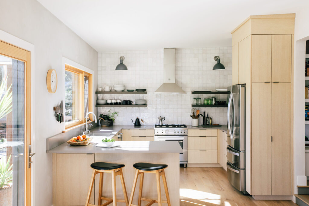 Instead of building a large house, Lars Langberg and Jennifer Becker turned an existing one-bedroom cabin into a bright and airy home just right for two. (Eileen Roche)