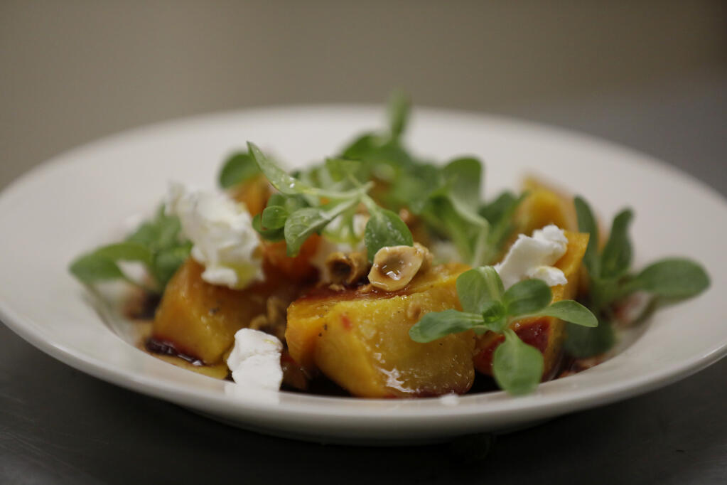 A golden beet salad with goat cheese and hazelnuts in a borscht vinaigrette, prepared by Chef Joshua Schwartz during a Hannukah cooking class at Congregation Shomrei Torah in Santa Rosa, Sunday, December 4, 2022. (Beth Schlanker/The Press Democrat)