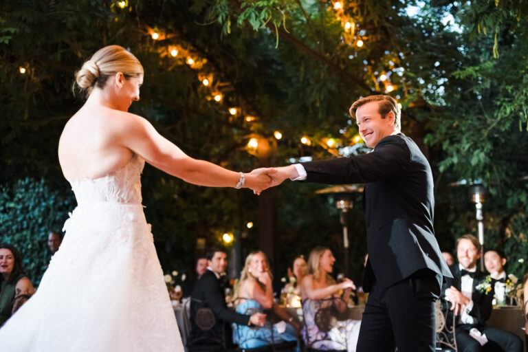 The couple perform a choreographed first dance. (Katie Monroe)