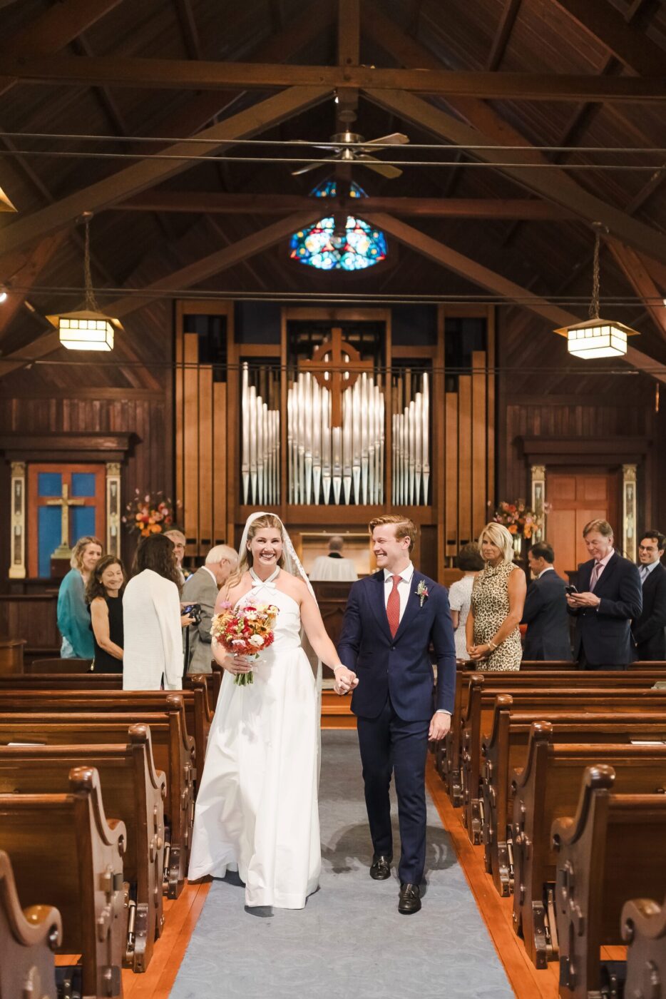 The couple had an intimate church ceremony before the second, bigger celebration. (Katie Monroe)