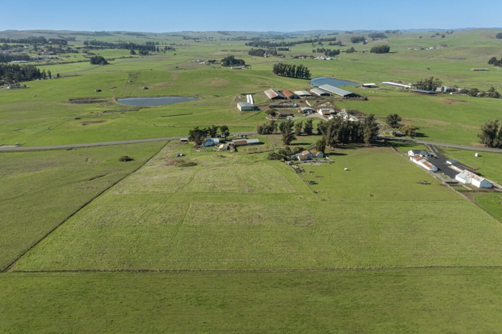 This 14-acre Petaluma property with a modernized three-bedroom, three-bathroom farmhouse, a junior ADU, and a large entertainment barn is currently listed for $2,249,000. (Jack Hecker Photography)
