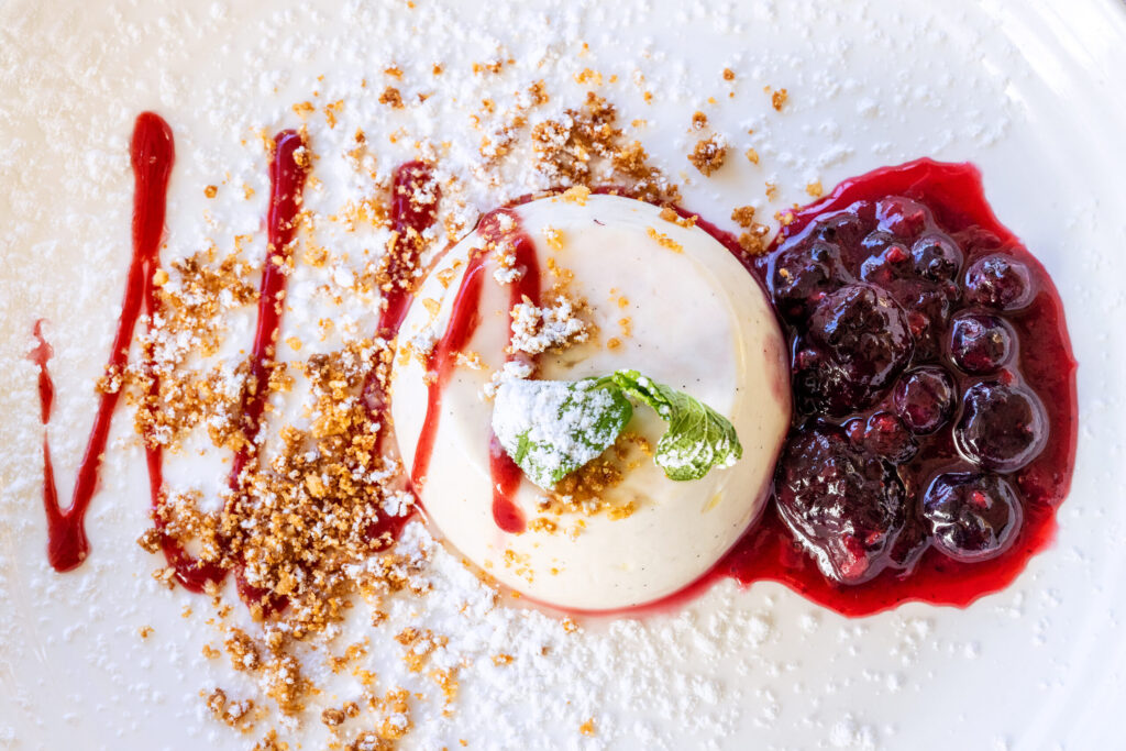 Traditional vanilla bean Panna Cotta served with wild berry sauce from Ca’Bianca Wednesday, Jan. 28, 2026 on Second Street in Santa Rosa. (John Burgess / The Press Democrat)
