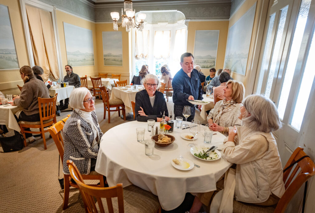 Old friends have lunch in the main dining room at Ca’Bianca Wednesday, Jan. 28, 2026 on Second Street in Santa Rosa. (John Burgess / The Press Democrat)