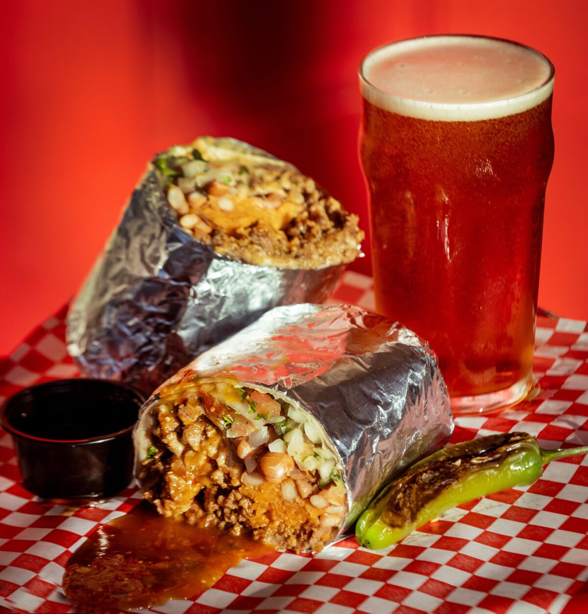 Super Burrito with a side of consume from Galvan’s Beer Garden Friday, Feb. 7, 2026 in Cotati. (John Burgess/The Press Democrat)