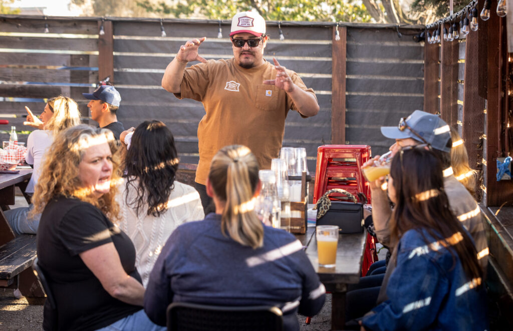 Galvan’s Beer Garden co-owner Omar Galvan talks with customers Friday, Feb. 7, 2026 in Cotati. (John Burgess/The Press Democrat)