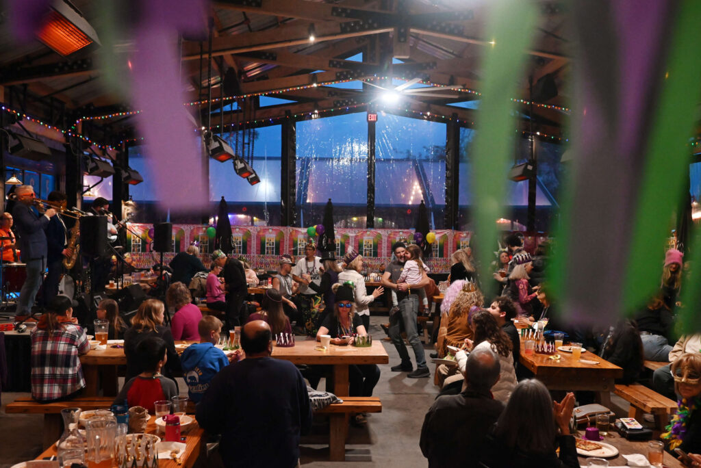 Attendees while The King Street Giants performed during the Petaluma Music Festival's 11th Annual Mardi Gras Party at Lagunitas Brewing Company Taproom and Sanctuary in Petaluma on Tuesday, March 4, 2025. (Erik Castro / For The Press Democrat)