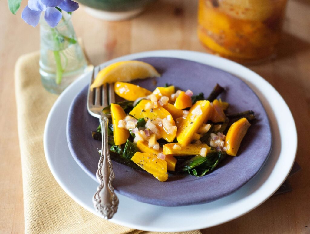 A simple roasted golden beet salad can be made with sauteed beet greens. (Liza Gershman)