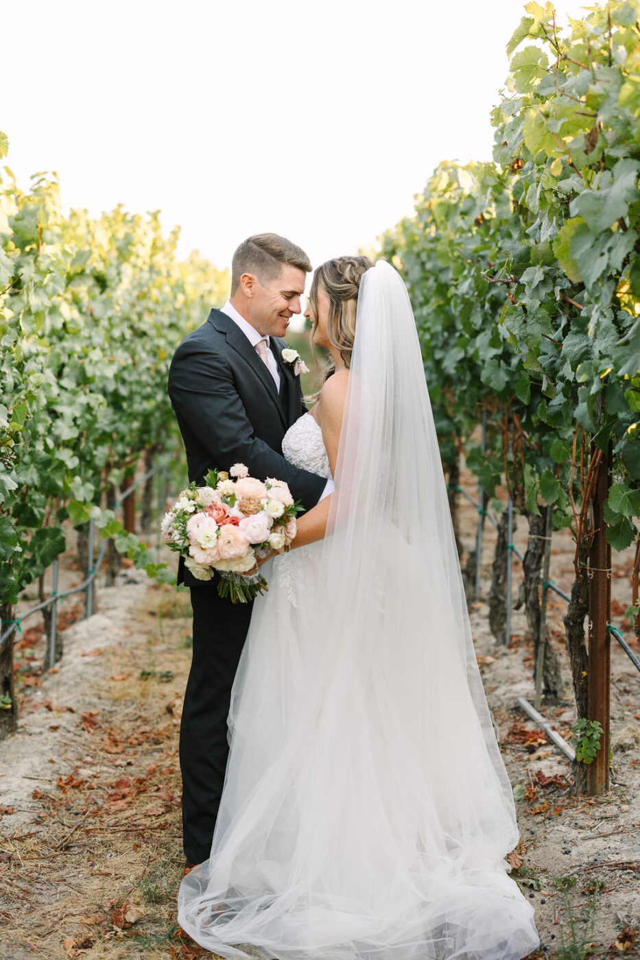 Despite a rainy start to the day, the clouds cleared to make for a picture perfect sunset for the newlyweds. (Amy Jordan)