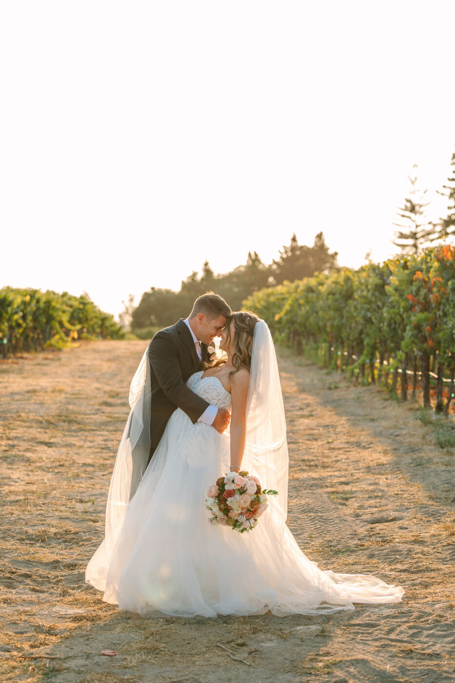 Despite a rainy start to the day, the clouds cleared to make for a picture perfect sunset for the newlyweds. (Amy Jordan)