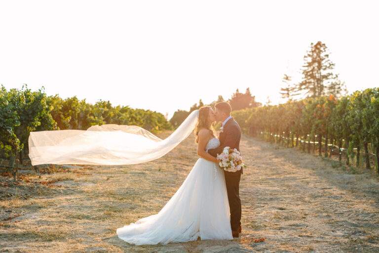 Kyndall and Blake wanted a relaxed yet elegant garden vibe as only Wine Country could provide. The couple's late summer ceremony was held at the Dutton Family property with its garden and refurbished barn. (Amy Jordan)